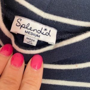 Mock turtleneck with shoulder cut out